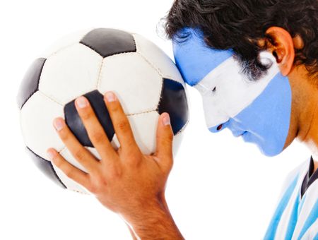 Argentinean football fan with flag painted on his face Ã?Â?Ã?Â� isolated