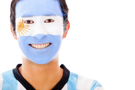 Man with Argentinean flag painted on his face Ã?Â?Ã?Â� isolated