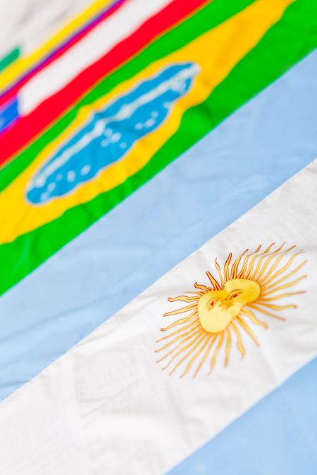Close up picture of different South American flags
