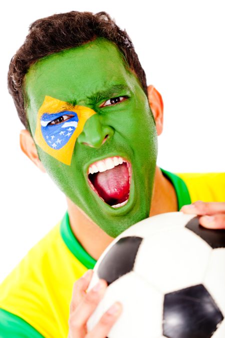 Brazilian football fan with flag painted on his face - isolated