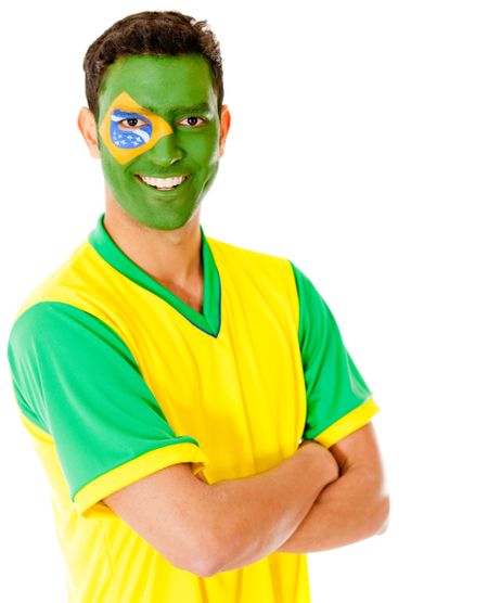 Man with Brazil flag painted on his face and smiling Ã?Â?Ã?Â� isolated