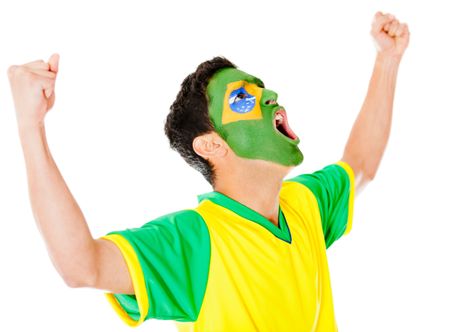 Excited Brazilian man with arms up celebrating - isolated over white