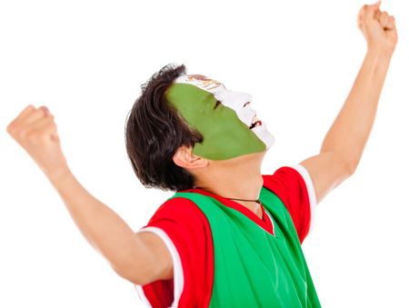 Excited Mexican man with arms up celebrating - isolated over white