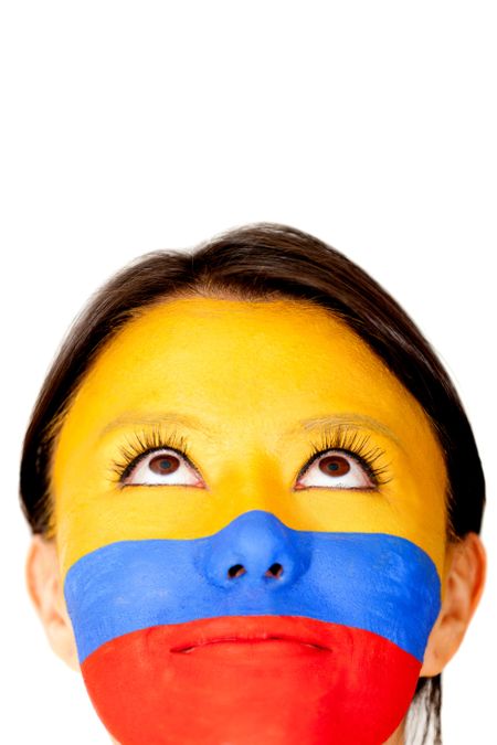 Colombian woman looking up - isolated over a white background