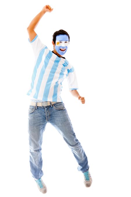 Happy Argentinean man celebrating with arms up - isolated over a white backgorund