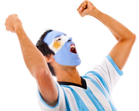 Argentinean man celebrating with arms up - isolated over a white background