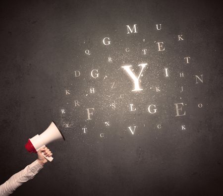 Caucasian arm holding megaphone with letter cloud