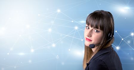 Young female telemarketer with blue background and connectivity concept