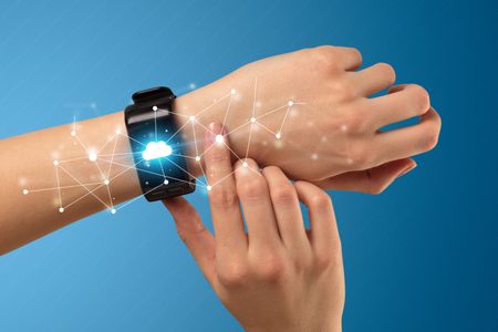 Naked female hand with smartwatch and with cloud technology and connection  symbol