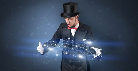 Magician with blue background and geometrical connection between two hands