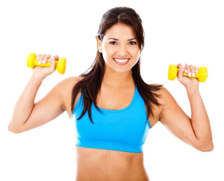 Athetic woman lifting freeweights - isolated over a white background