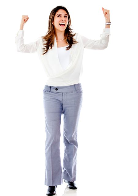 Successful businesswoman celebrating - isolated over a white background