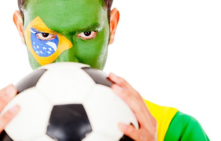 Brazilian football fan holding a ball - isolated over a hwite background