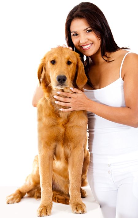 Woman smiling with a cute dog - isolated over a white background