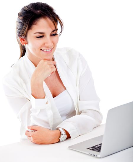 Businesswoman working on the computer - isolated over a white background
