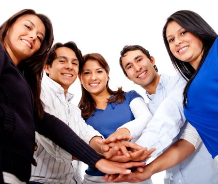 Group of people with hands together in the middle - isolated