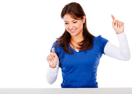 Woman pointing with two fingers - isolated over a white background