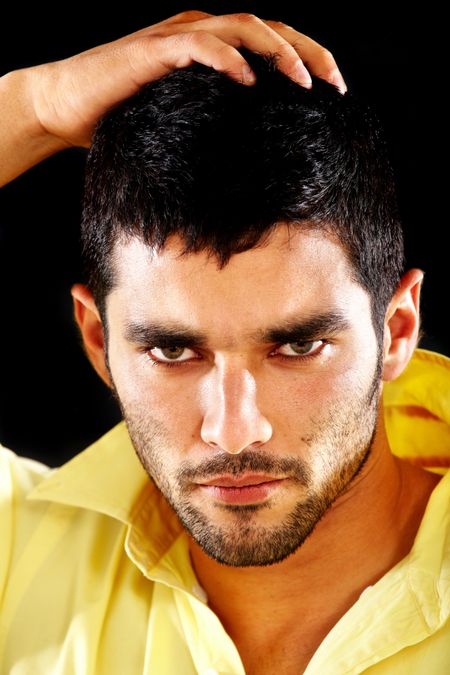 fashion man portrait isolated over a black background