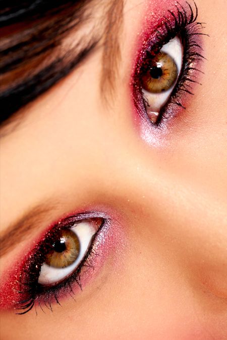 beautiful female eyes with violet make up
