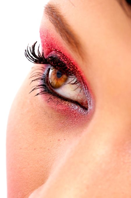 female eye closeup with make up isolated over a white background