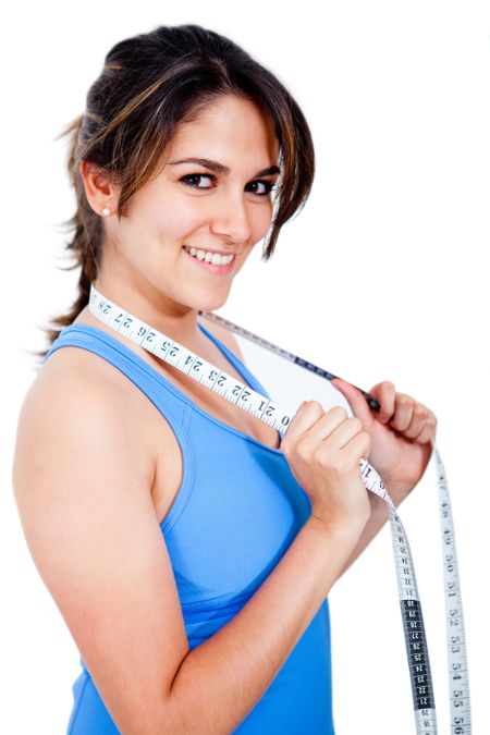 Woman with a measure tape - isolated over a white background