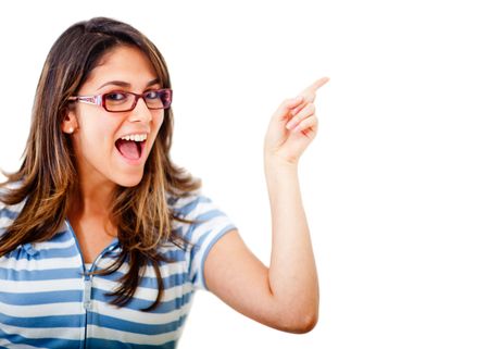 Excited woman pointing an idea with her finger - isolated over white