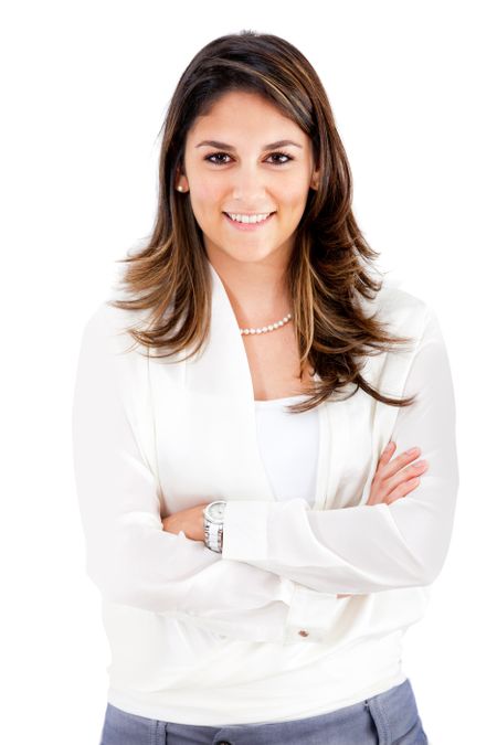 Confident business woman with arms crossed - isolated over a white background