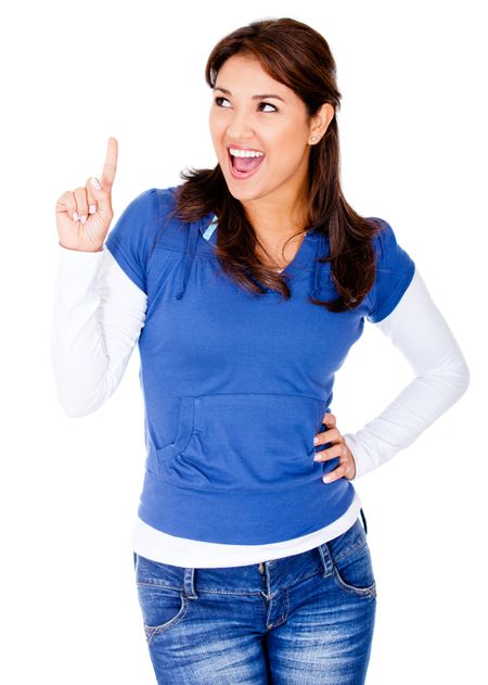 Happy woman pointing an idea with her finger - isolated over white