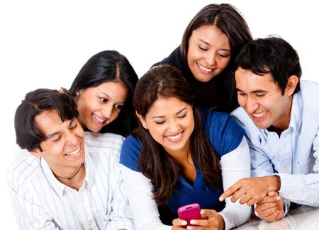 Group of people looking at a cell phone  and smiling - isolated