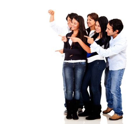 Group of friends pointing at an imaginary object - isolated over a white background