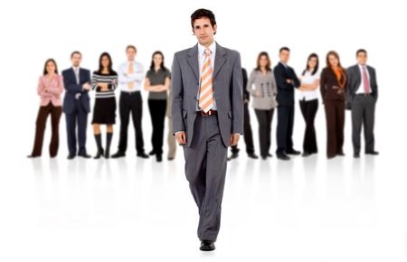 business man walking and leading the team in front of the group isolated over a white background