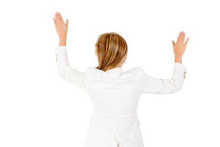 Businesswoman with arms open touching the wall - isolated over white