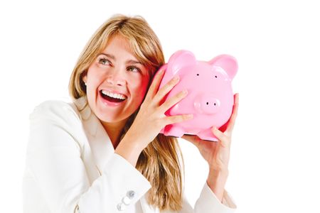 Business woman shaking a piggybank - isolated over a white background