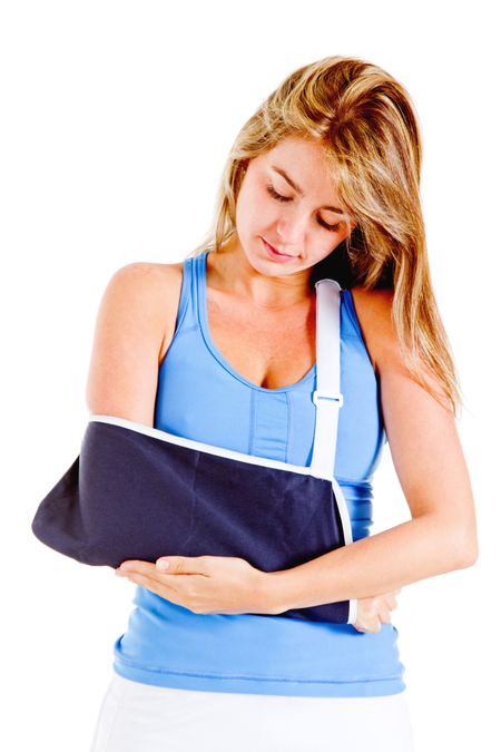Woman with a broken arm - isolated over a white background