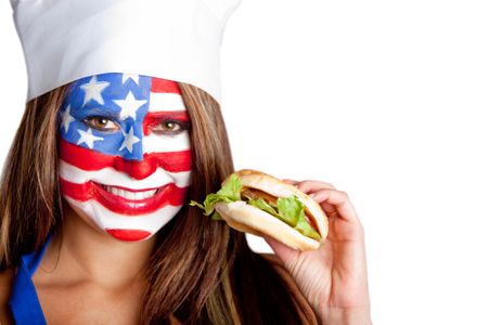 American woman eating a hamburger Ã?Â?Ã?Â� fast food concepts