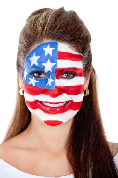 American woman with the USA flag painted on her face - isolated