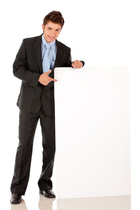 Business man holding a banner ad - isolated on white