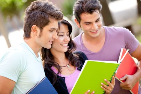 group-students-notebooks-smiling-outdoors-102130588 Group of students with notebooks smiling outdoors