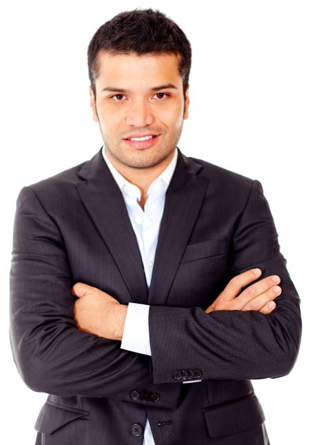 Latin businessman with arms crossed - isolated over a white background