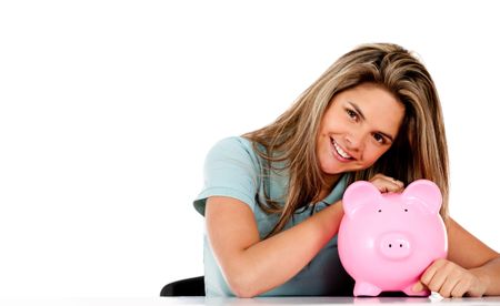 Happy woman with her savings in a piggy bank Ã?Â?Ã?Â� isolated