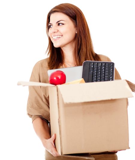 Happy woman moving house and packing - isolated over white