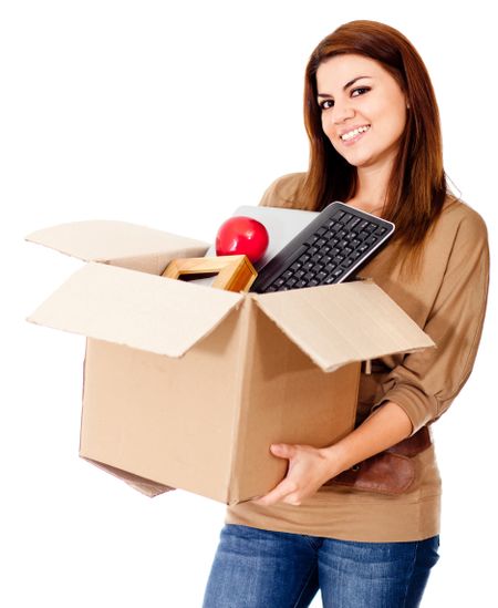 Woman moving house and holding a box - isolated over a white background