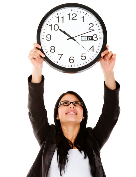 Business woman hanging a clock Ã?Â¢?? isolated over a white background