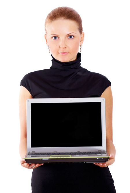 Business woman displaying a laptop computer - isolated over a white background