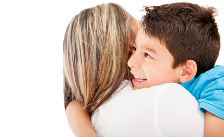Son hugging his mother - isolated over a white background