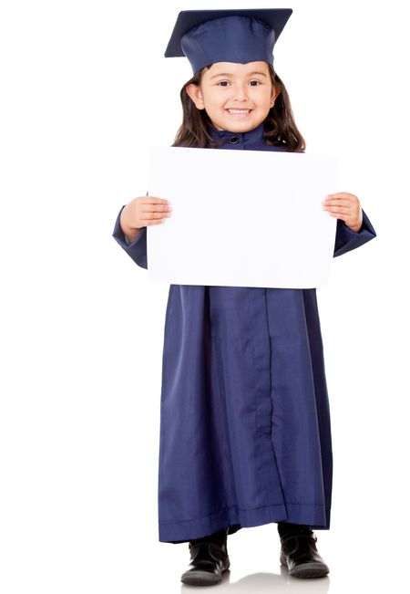 Little girl graduating and holding diploma Ã¢Â?Â? isolated over white
