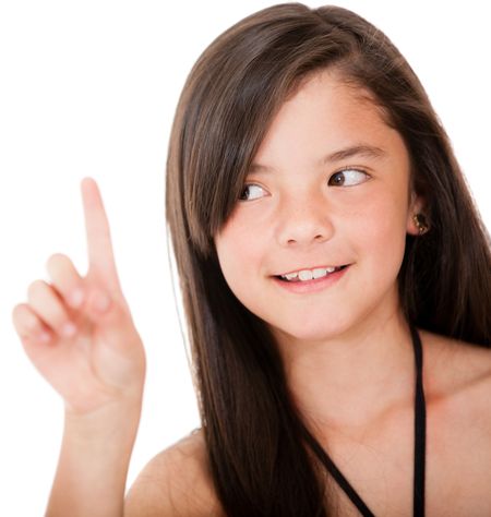 Girl pointing up with her finger - isolated over a white background