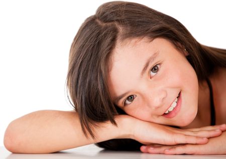 Cute girl  leaning on the table - isolated over a white background