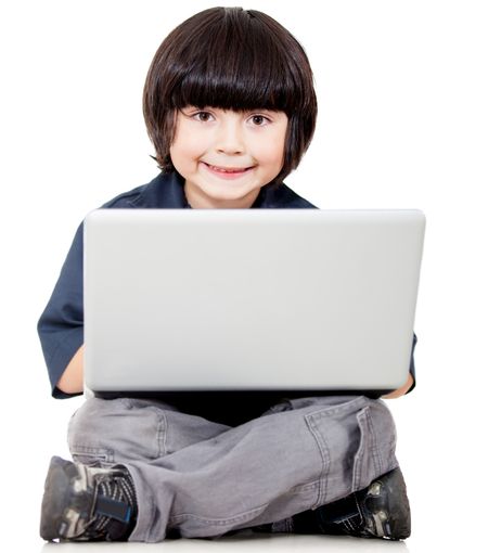 Boy with a laptop computer - isolated over a white background