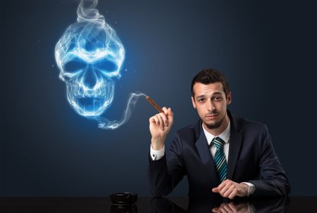 Businessman smoking with skull simbol above his head.